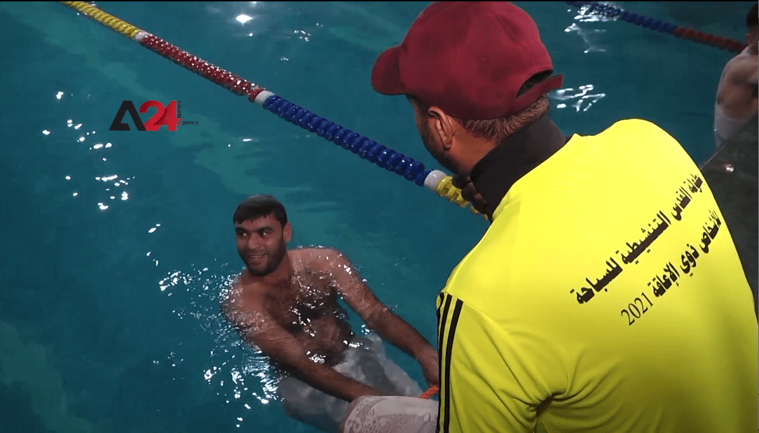 فلسطين- اللجنة البارلمبية في غزة تنظم بطولة السباحة لمبتوري الاقدام