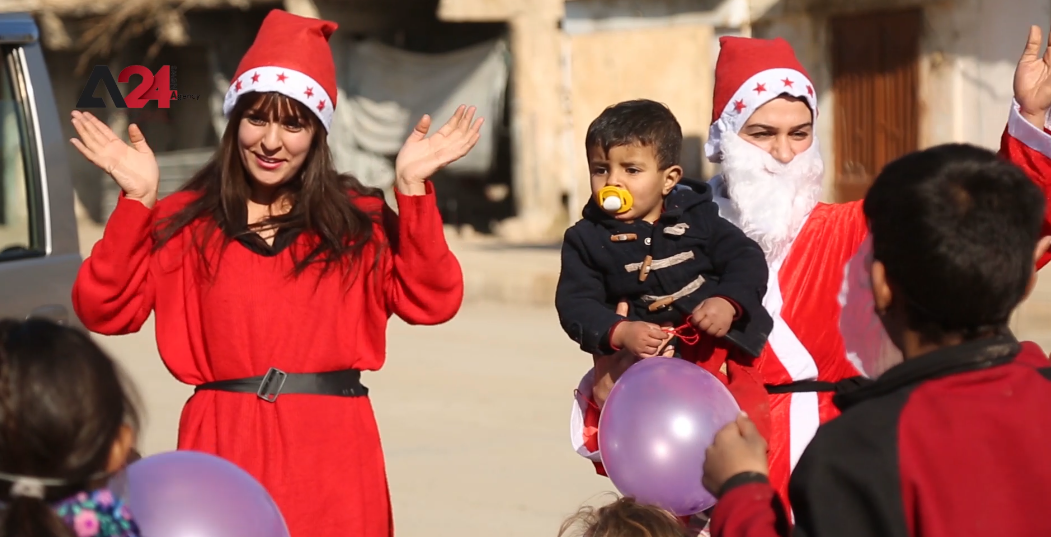 سوريا- متطوعون في القامشلي يوزعون الهدايا على الأطفال برأس السنة